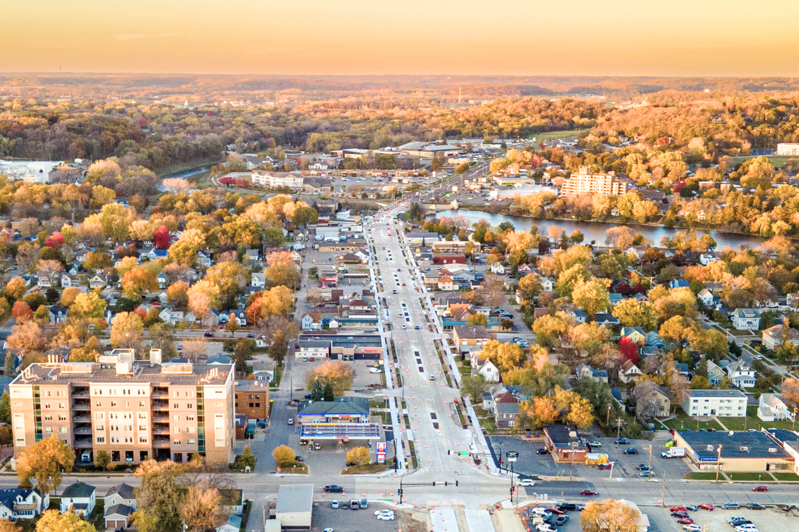 a view of broadway avenue from a drone during peak fall colors