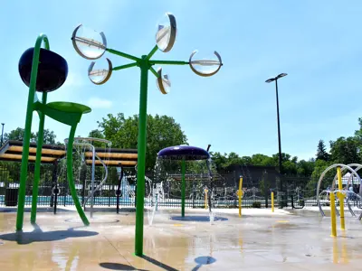 Splash Pad at Silver Lake Pool with water turned on but nobody using it.