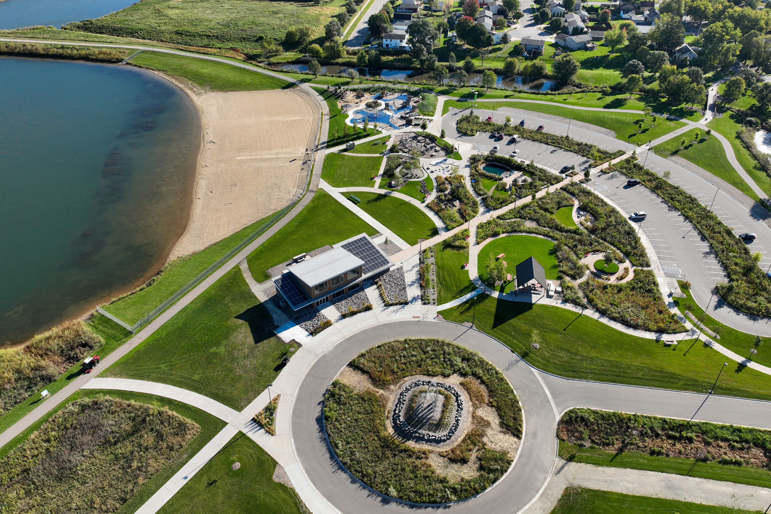 an aerial view of Cascade Lake Park, it's facilities and the beach
